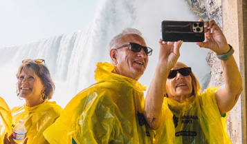 family in ponchos at Journey Behind the Falls